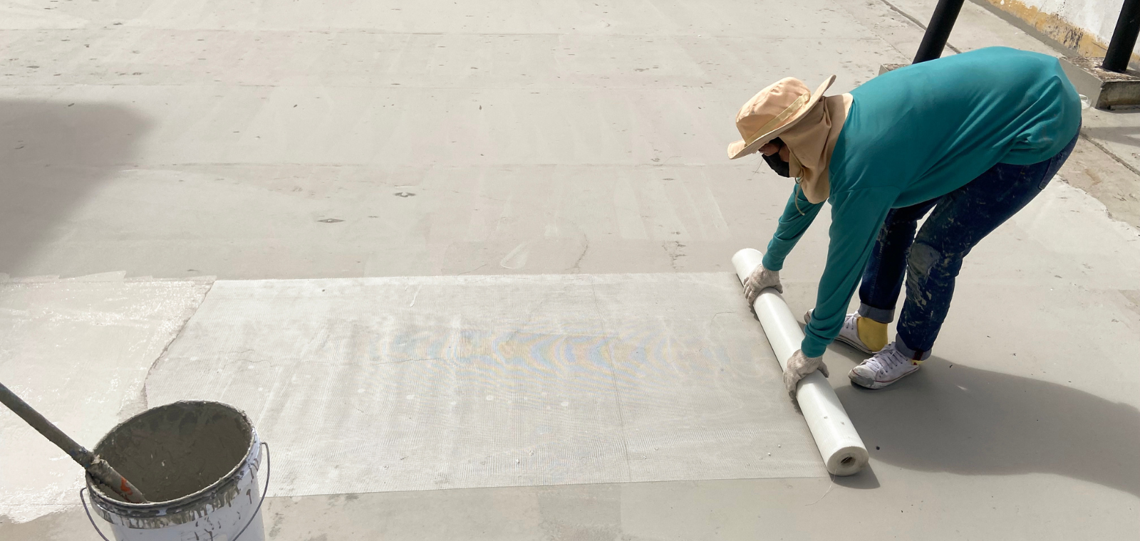 TPO white membrane flat roof heat welding seam on commercial building in Massachusetts