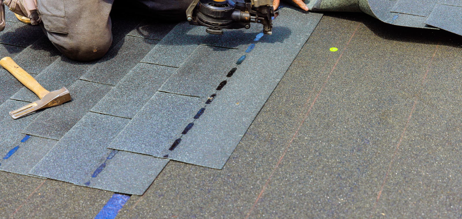 Architectural asphalt shingle samples showing texture and material options